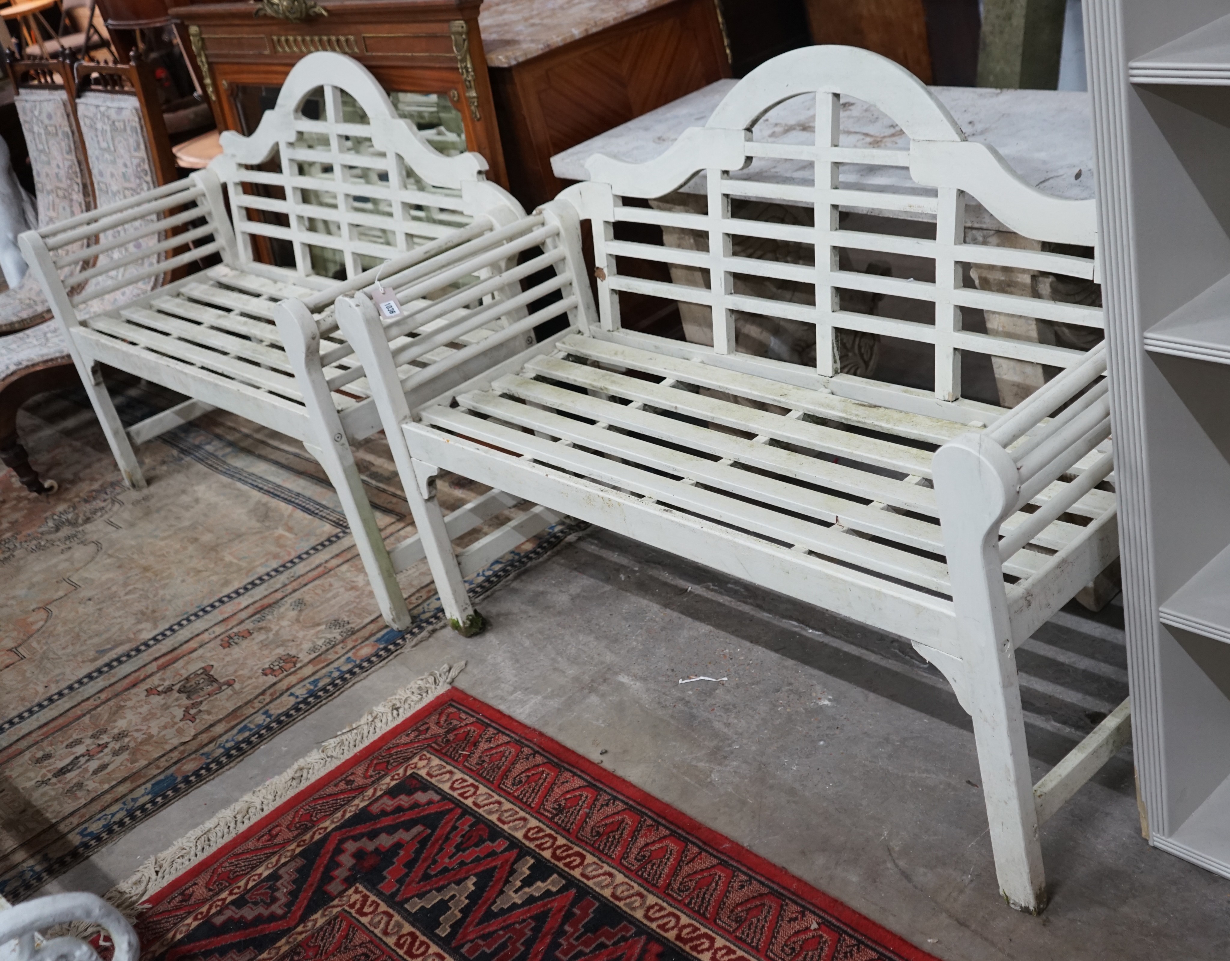 A pair of small Lutyens style painted garden benches, length 130cm, depth 45cm, height 90cm